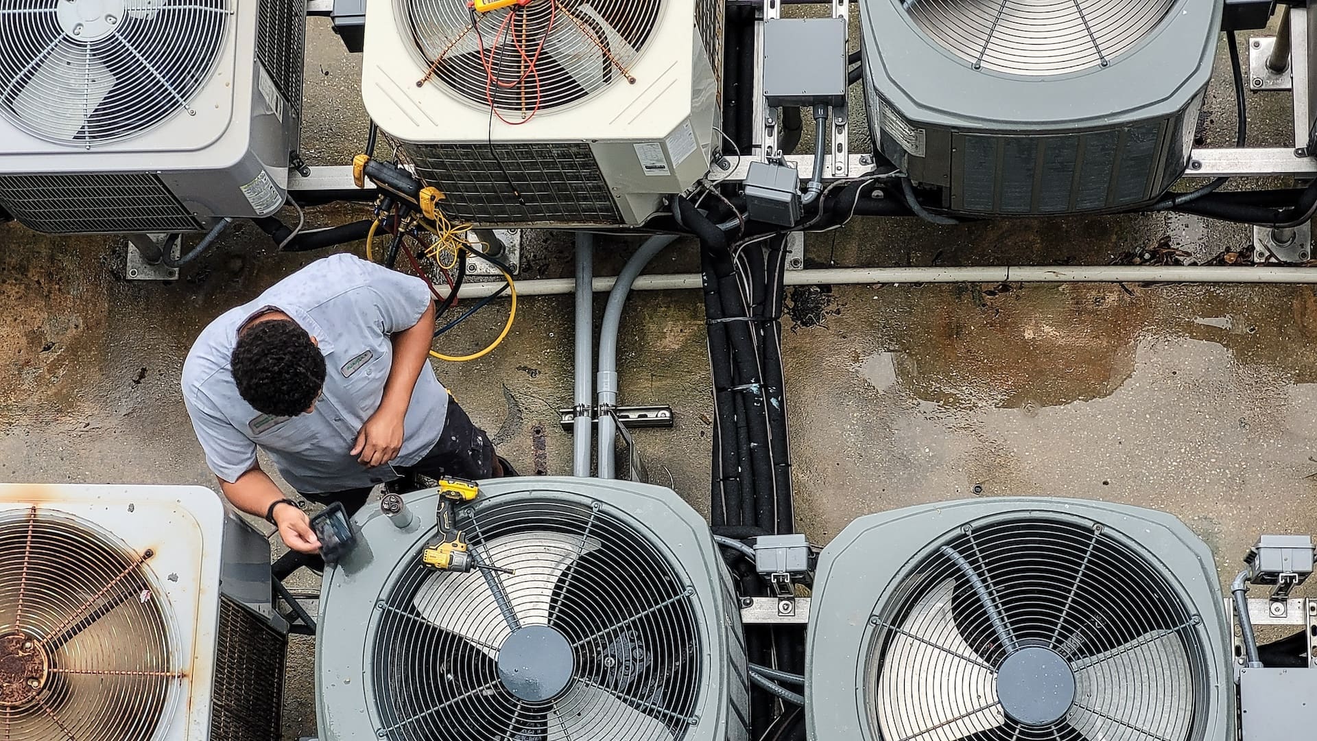 Andrew's technician performing Preventative Commercial HVAC Repair and Maintenance